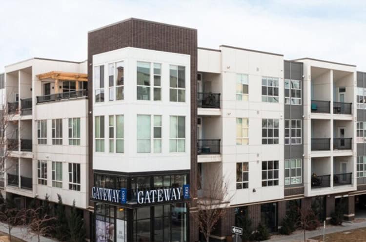 Modern multi-family apartment building with retail space at Gateway, Hibernia Housing project in Denver.